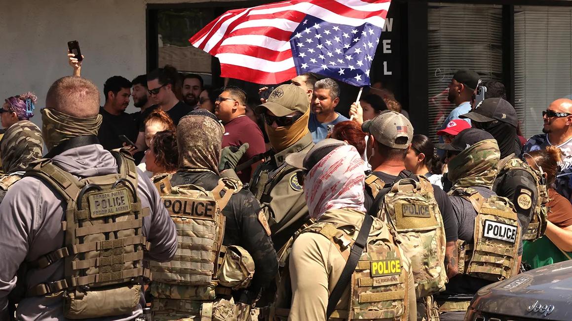 protesters confront ice agents 2
